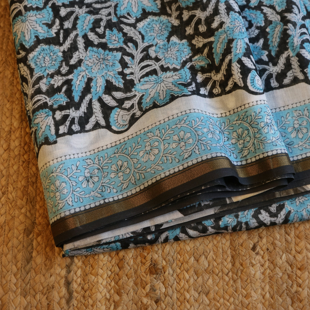 Pure Chanderi Silk Saree with Elegant blue  Prints and Zari Border – 100% Handloom .