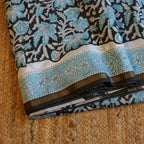 Pure Chanderi Silk Saree with Elegant blue  Prints and Zari Border – 100% Handloom .