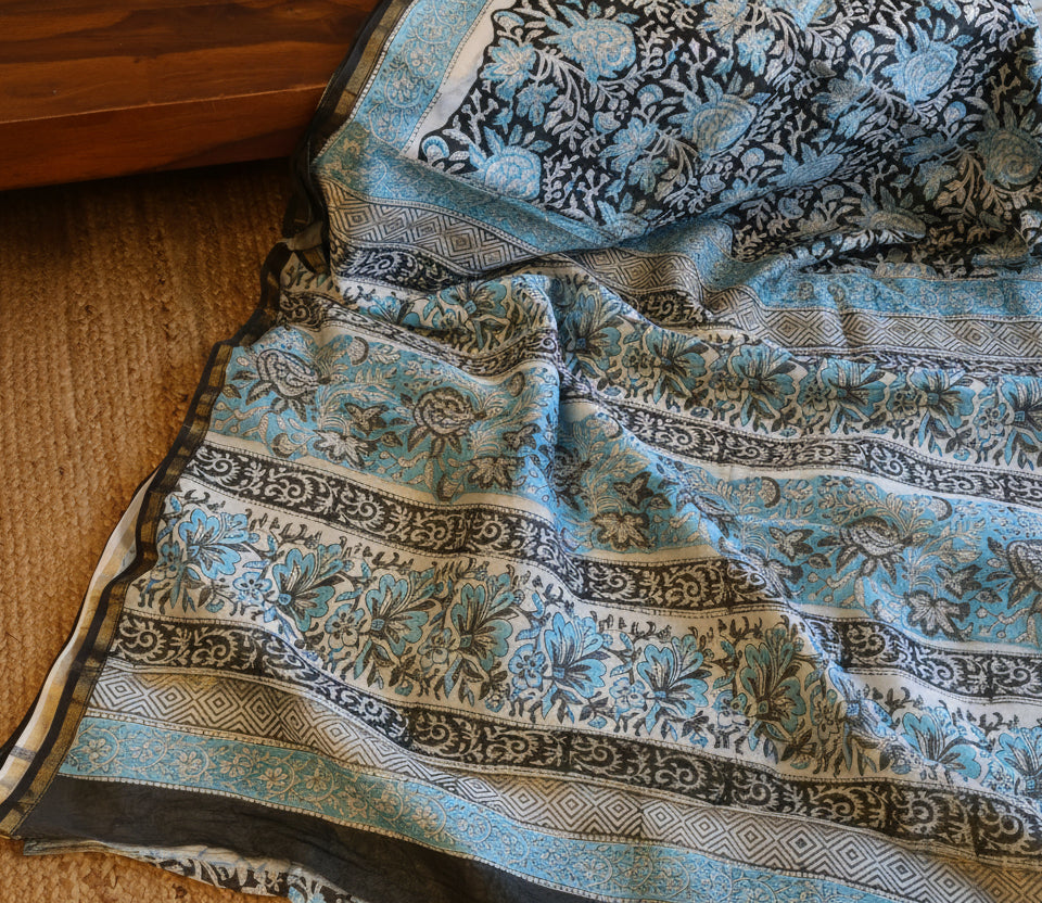 Pure Chanderi Silk Saree with Elegant blue  Prints and Zari Border – 100% Handloom .