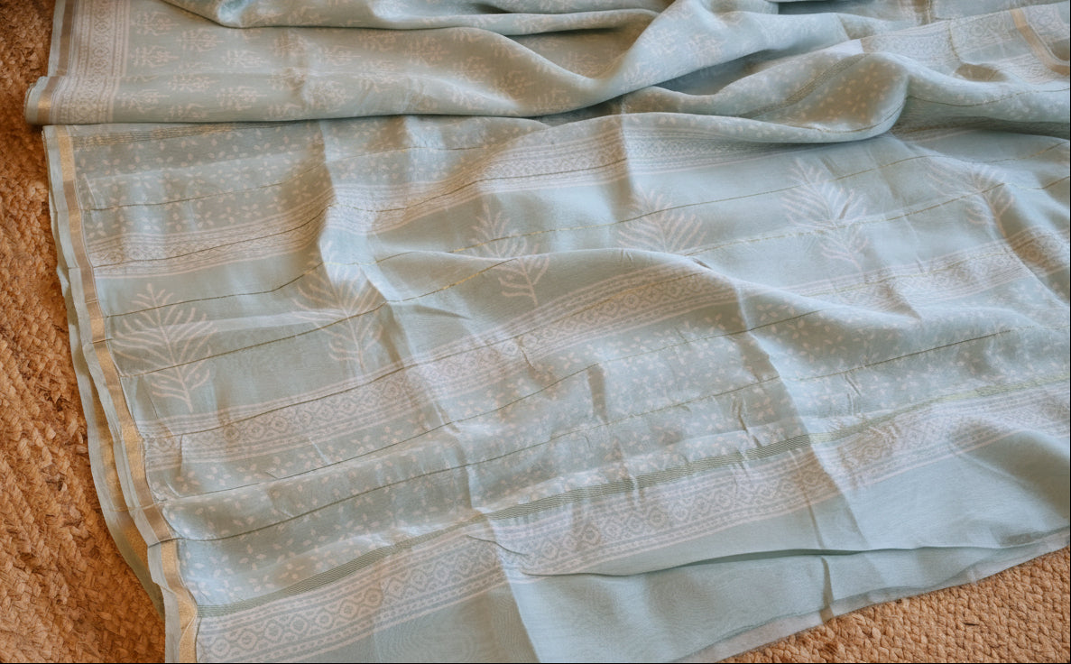 Pure Chanderi Silk Saree with Elegant blue &nbsp;Prints and Zari Border – 100% Handloom.