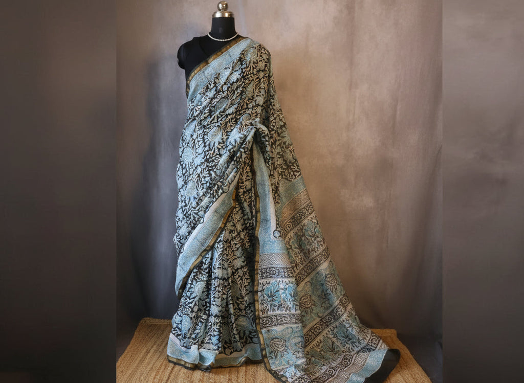 Pure Chanderi Silk Saree with Elegant blue  Prints and Zari Border – 100% Handloom .