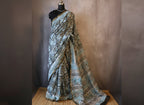 Pure Chanderi Silk Saree with Elegant blue  Prints and Zari Border – 100% Handloom .