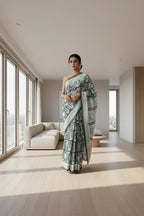 Pure Chanderi Silk Saree with Elegant blue  Prints and Zari Border – 100% Handloom .