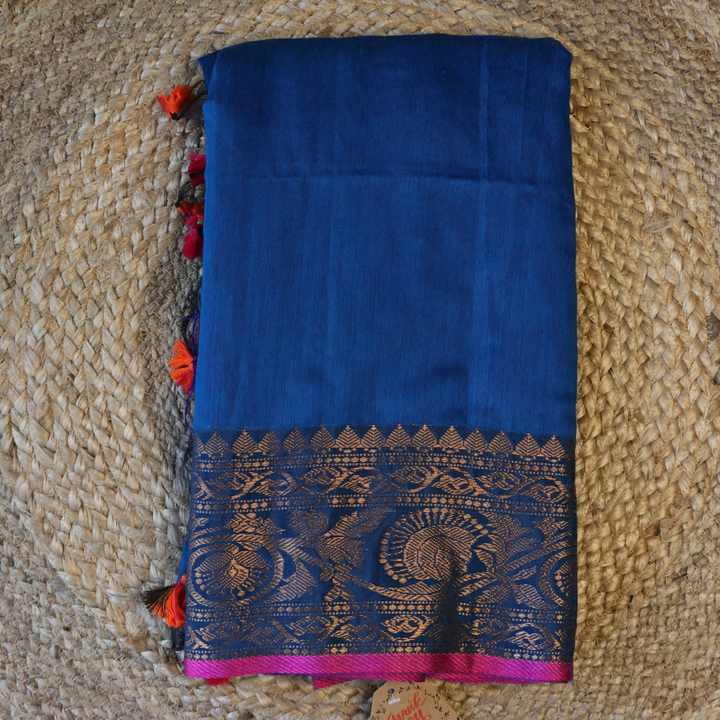 Handwoven Saree with Pure Zari cotton raw silk blend with blouse. Light weight easy to drape. Comfortable all day .