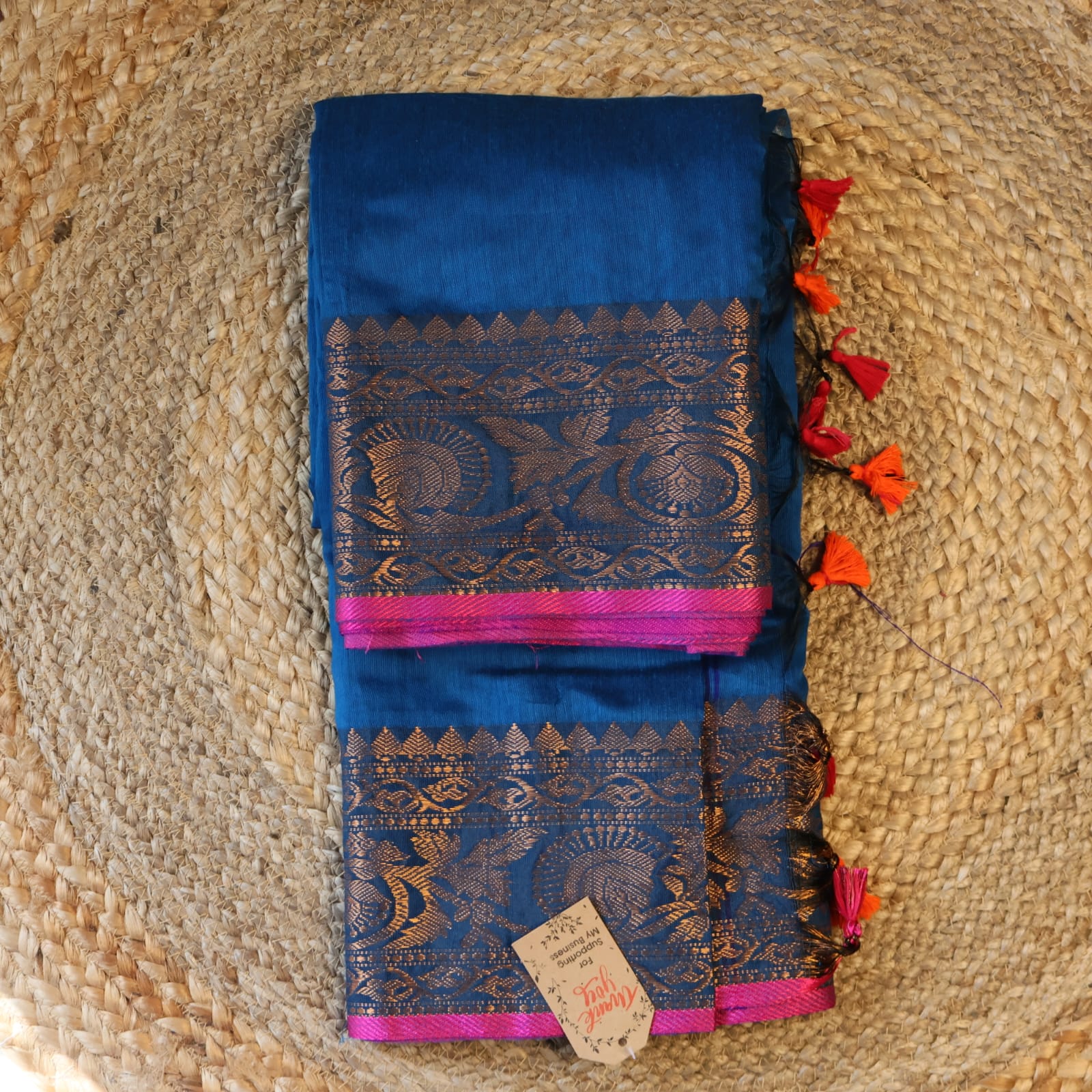 Handwoven Saree with Pure Zari cotton raw silk blend with blouse. Light weight easy to drape. Comfortable all day .