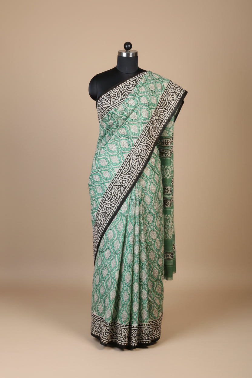 Mulmul cotton Saree with blouse –  This saree is rewashed for softness and organically dyed. Light weight easy to drape. Comfortable all day .